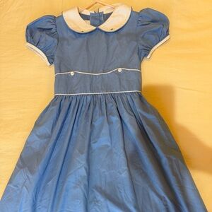 Traditional girls blue dress. Classic style for church school or family pictures